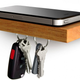 Illustration for article titled This Tiny Smartphone Shelf Can Hold Thousands of Books, Photos, CDs, and Movies